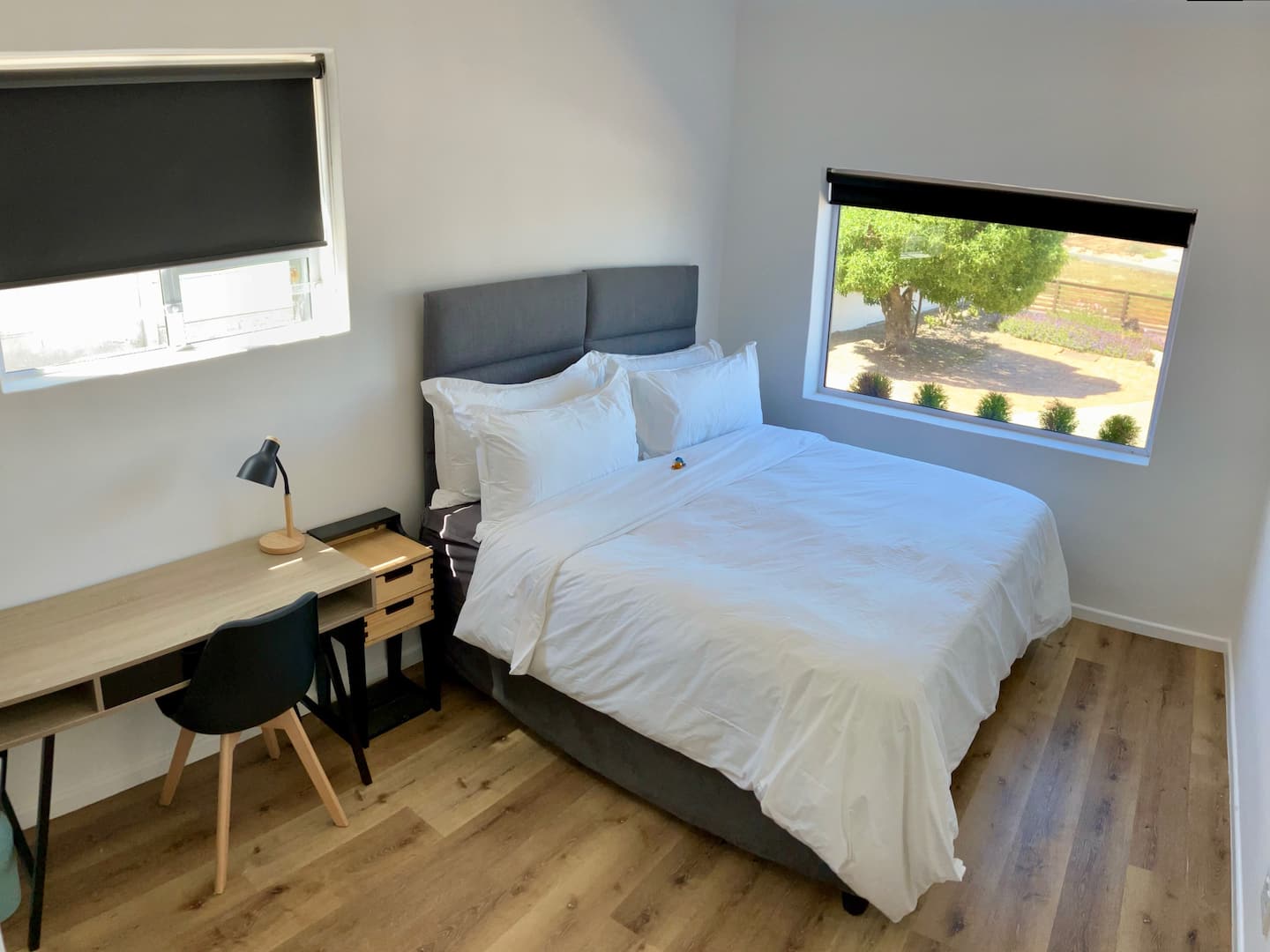 Second king bedroom with white bedding